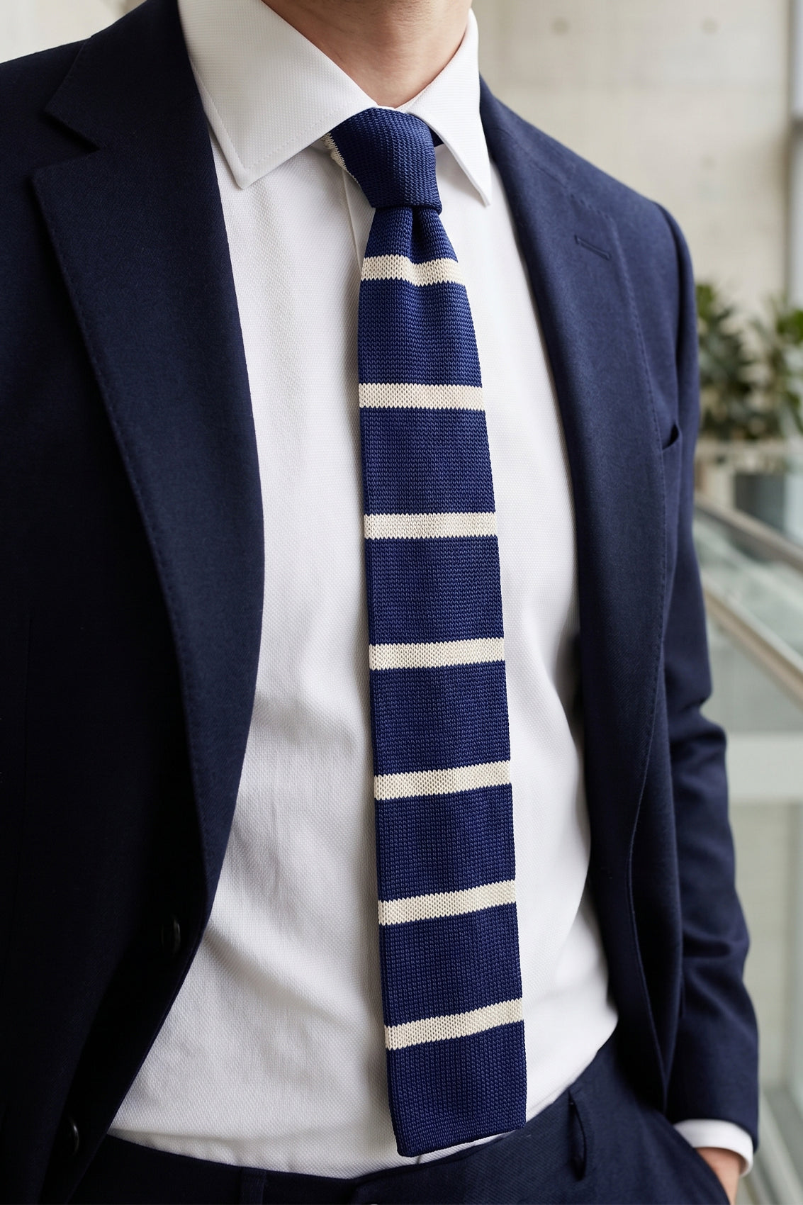 Drew Navy/White knitted tie with striped design, ideal for weddings, evening events, and formal occasions.