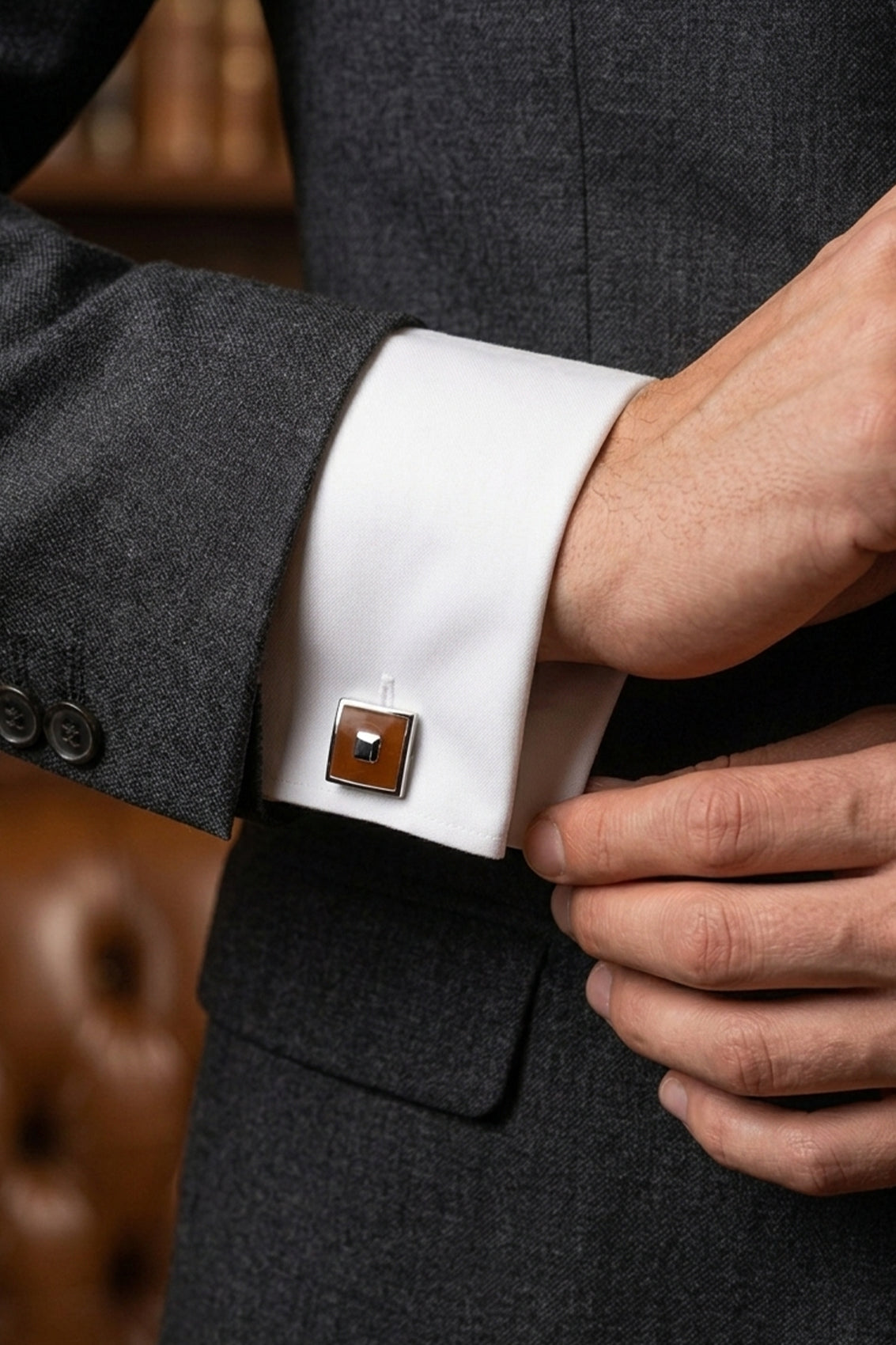 Square brown men’s cufflinks featuring rich enamel finish and intricate metal detailing, crafted for formal elegance and precision craftsmanship.
