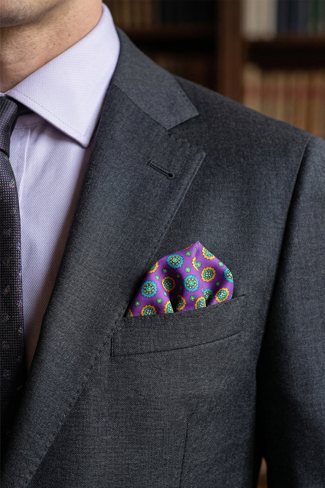 Men’s purple silk handkerchief with an intricate geometric pattern, ideal for weddings, smart occasions, or elevated everyday styling.