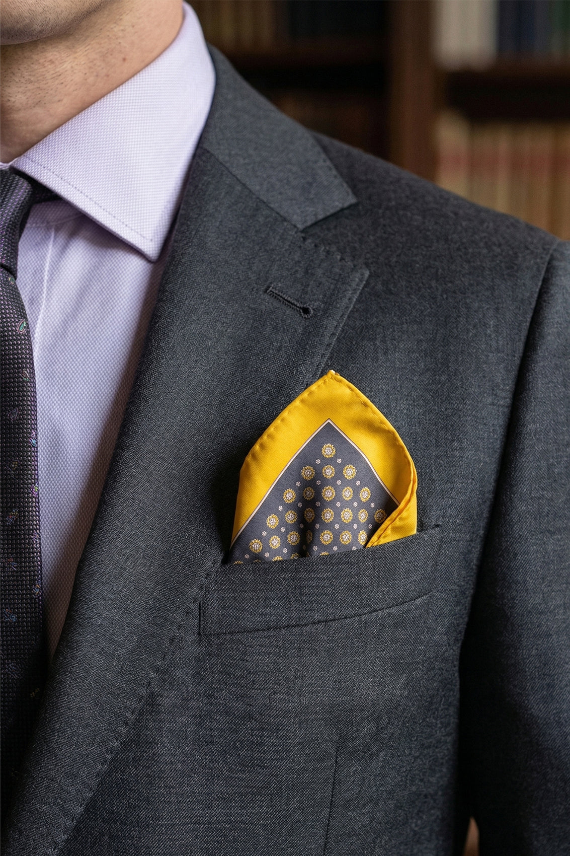 Men’s grey and yellow silk handkerchief with a geometric pattern, crafted for weddings, formal occasions, or elegant everyday wear.