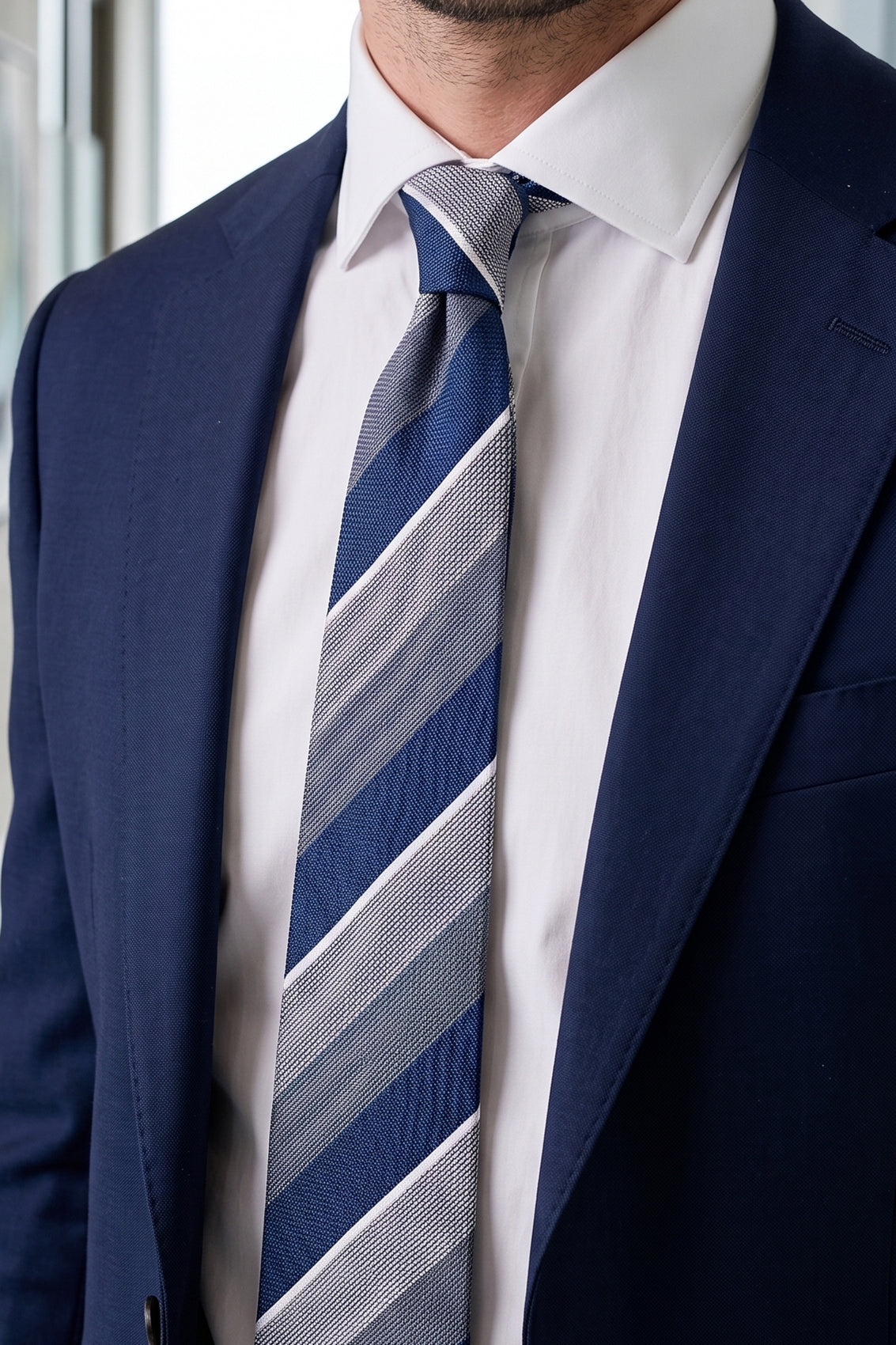 Percy Navy tie with classic striped design, perfect for weddings, parties, and formal occasions.