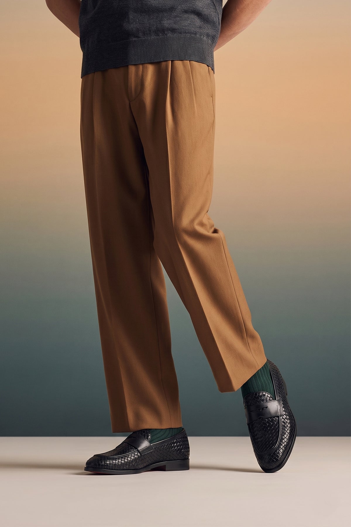Santiago Black woven leather loafers for men displayed in a side profile, showcasing the textured leather and sleek, elegant silhouette suitable for formal or casual wear.
