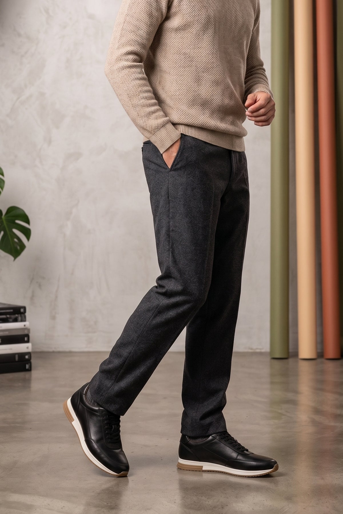 Model wearing Spencer Black classic men’s sneakers crafted from premium leather, combining style and comfort for casual and smart wear.
