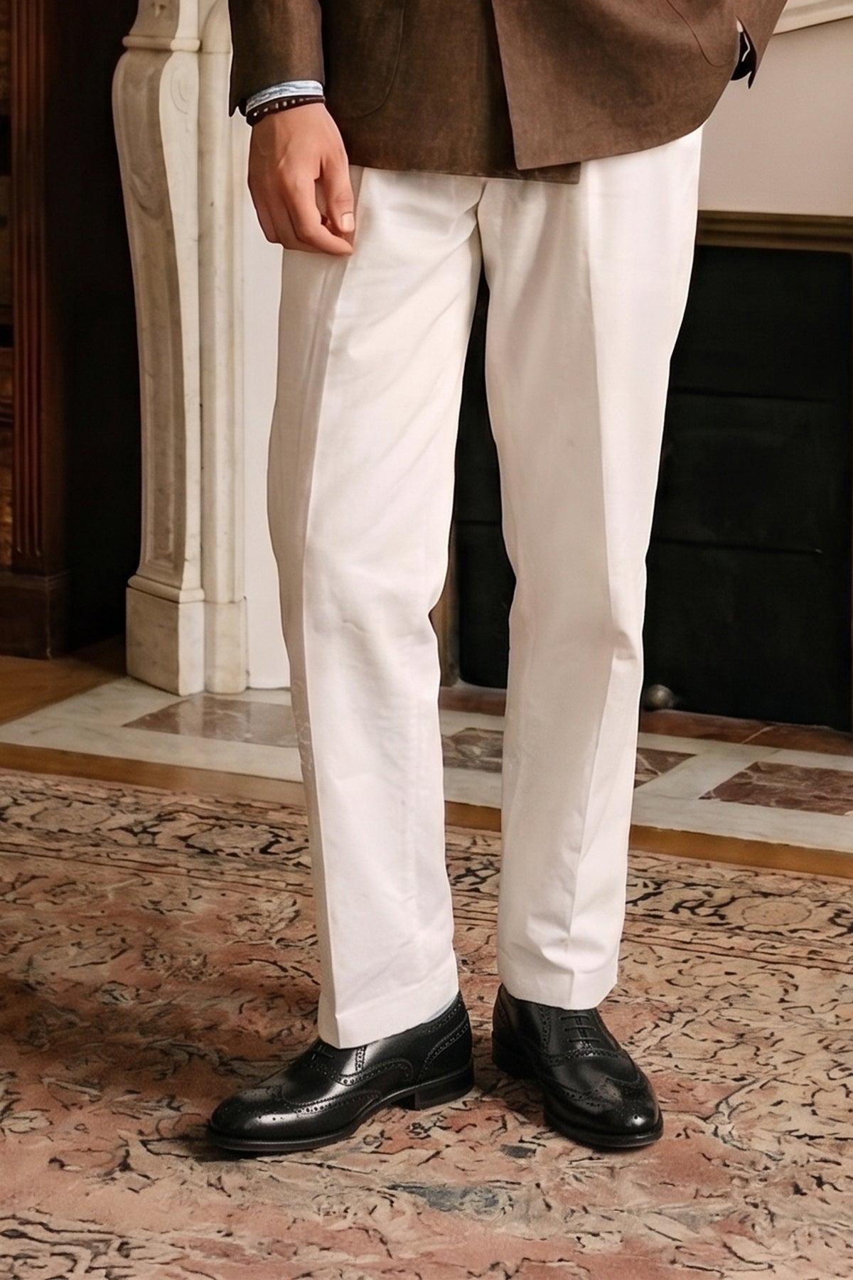 Model wearing Stokes BlackOxford Brogues for men in premium leather with detailed broguing, perfect for formal wear or dressing up smart casual looks.