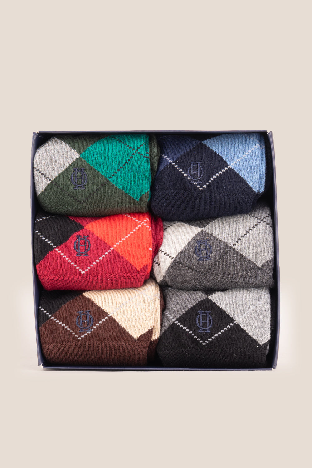 Six pairs of premium cotton socks designed by Oswin Hyde for the discerning gentleman.
