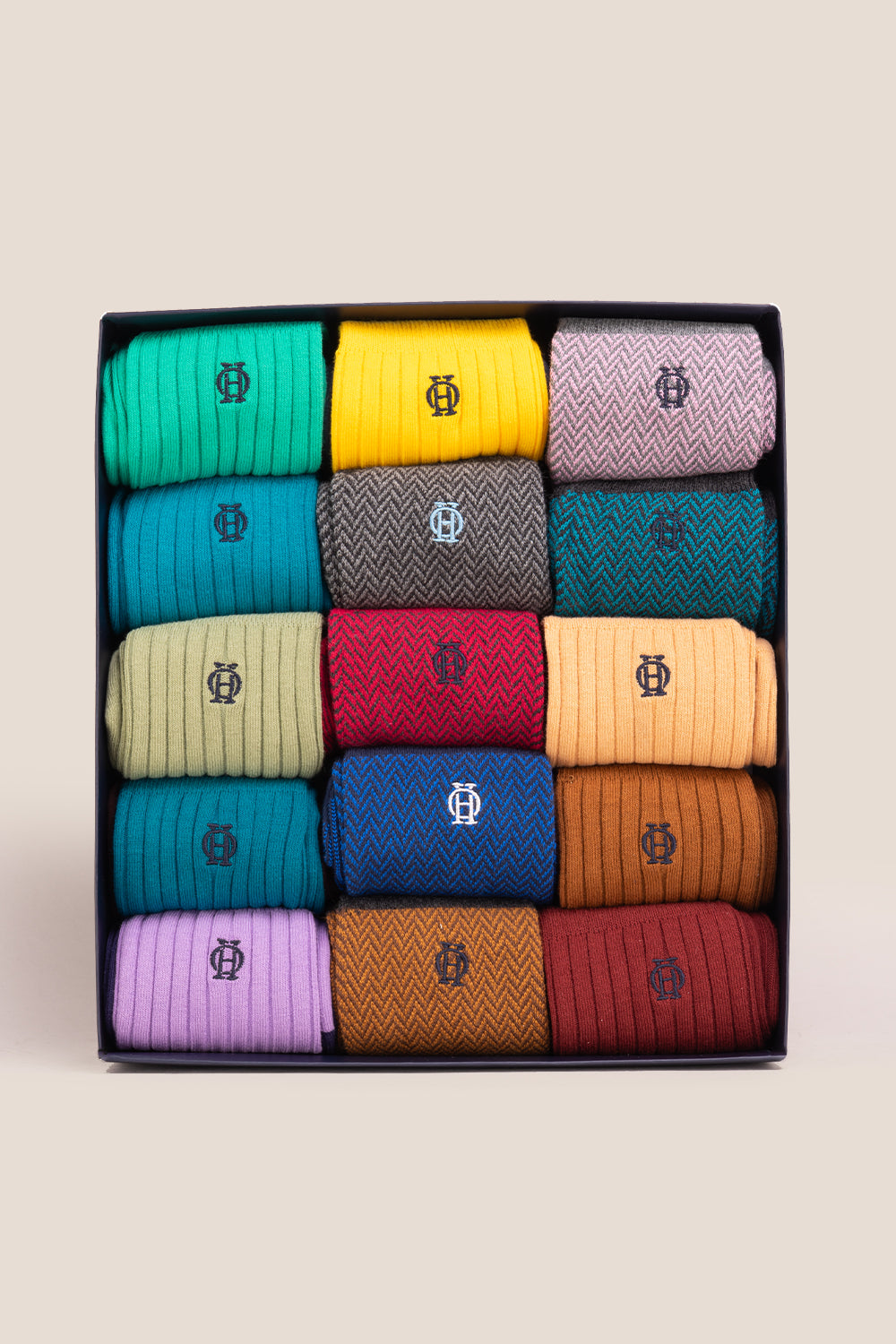 Fifteen pairs of premium herringbone socks designed by Oswin Hyde for the discerning gentleman.