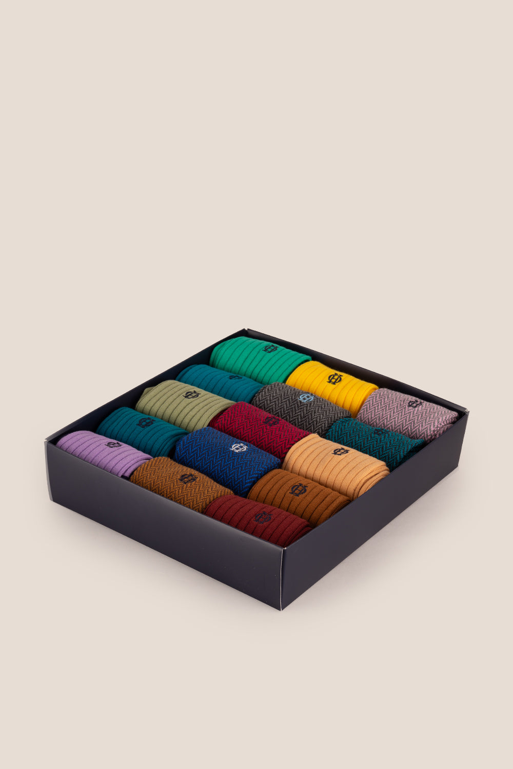 Fifteen pairs of premium herringbone socks designed by Oswin Hyde for the discerning gentleman.