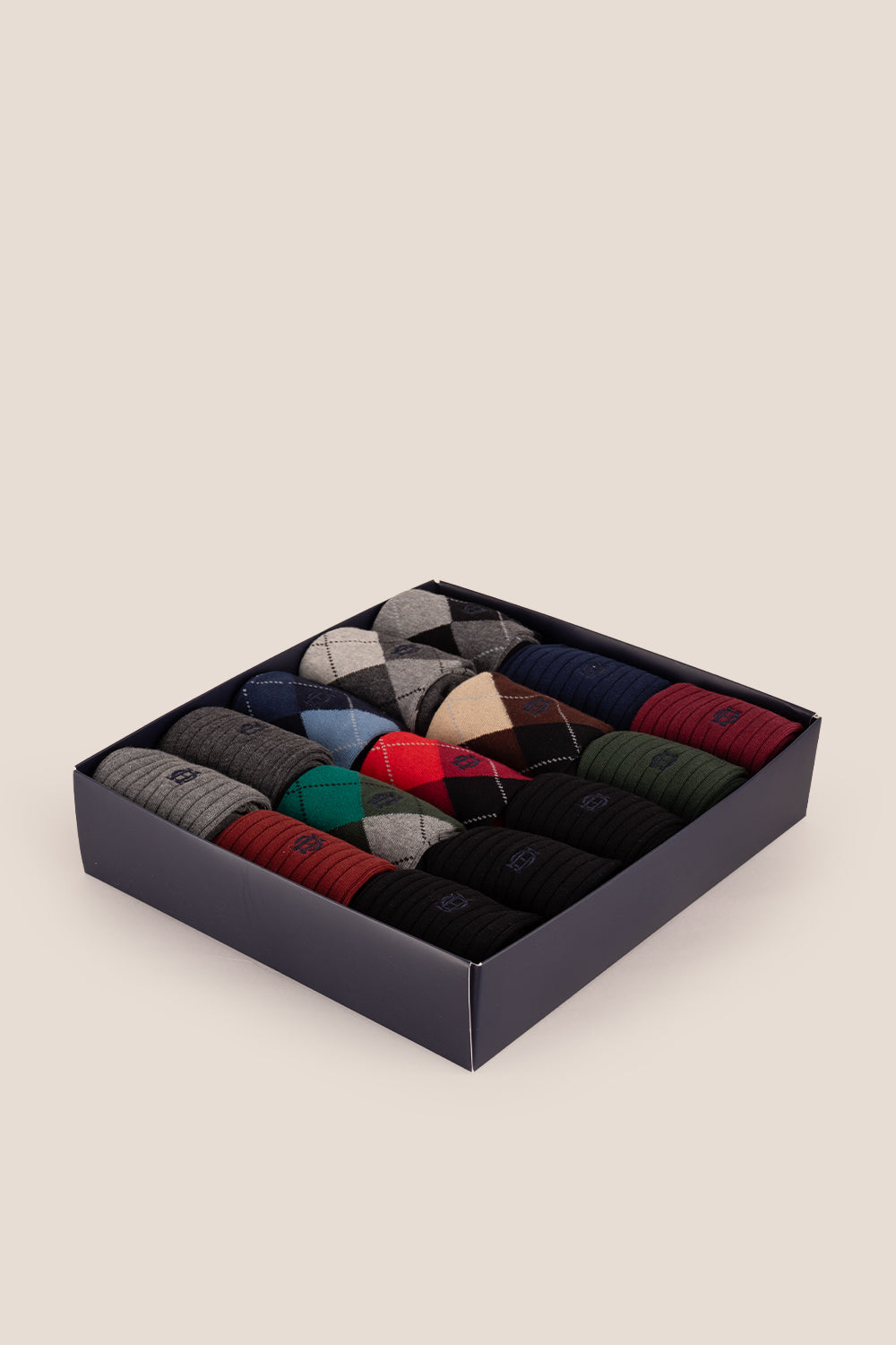 Fifteen pairs of premium cotton socks designed by Oswin Hyde for the discerning gentleman.