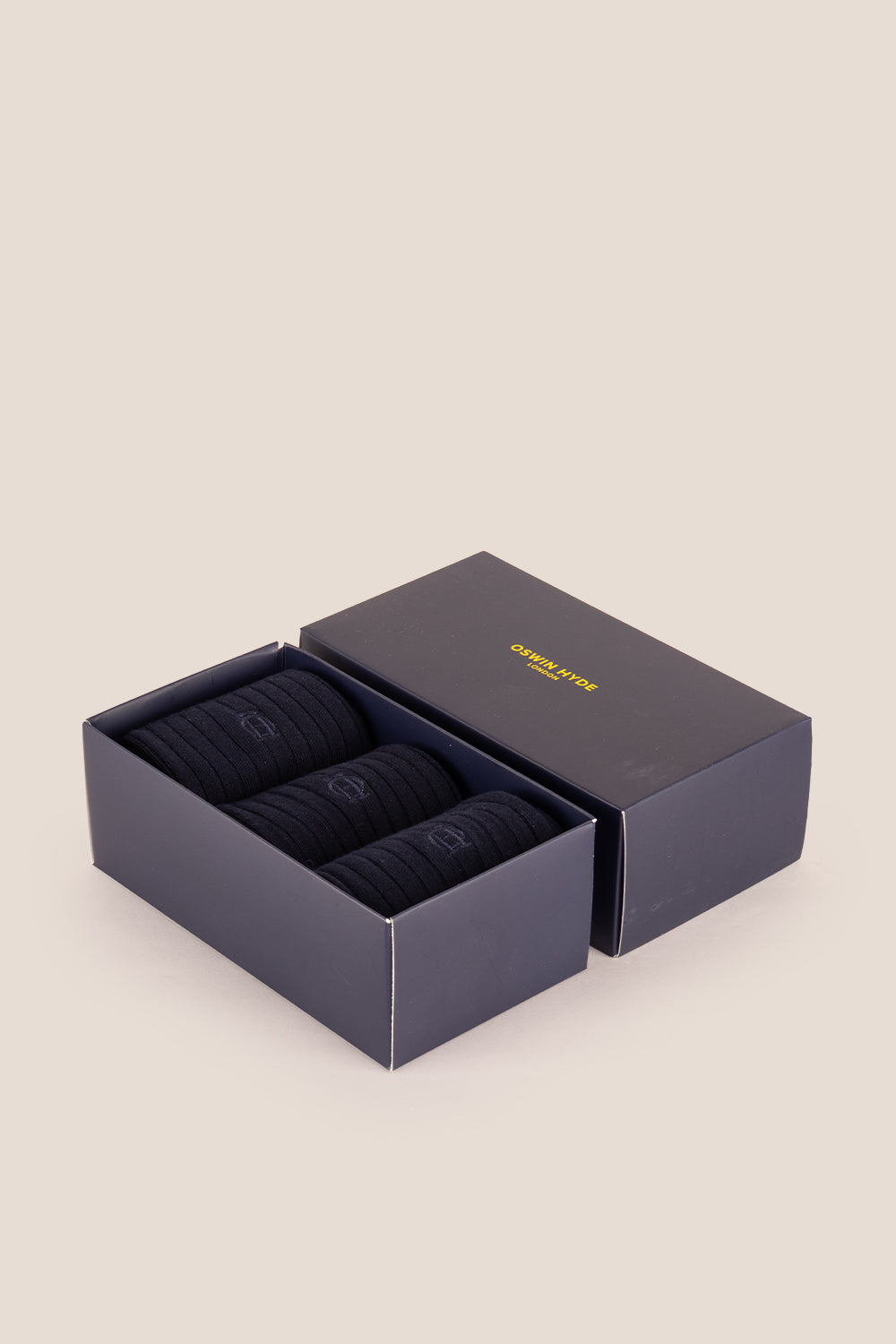 Three pairs of premium Navy cotton socks designed by Oswin Hyde for the discerning gentleman.