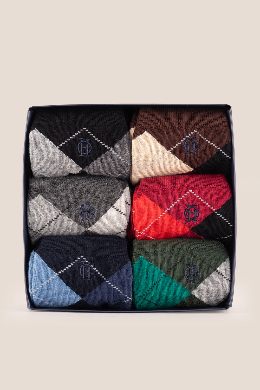 Six pairs of premium cotton socks designed by Oswin Hyde for the discerning gentleman.