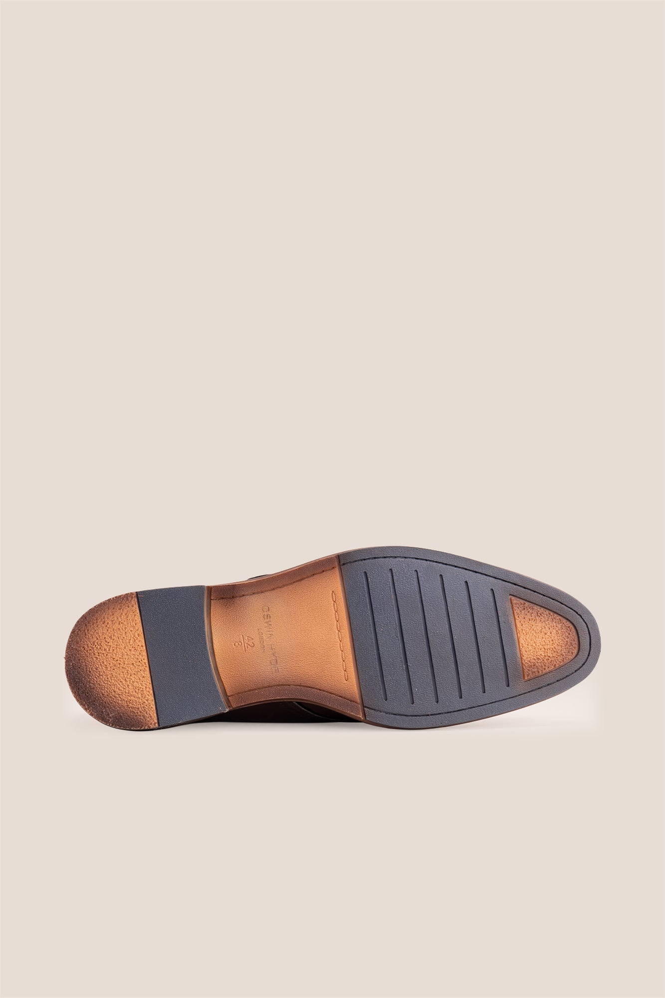 Premium men's brown leather single monk strap dress shoes by Oswin Hyde London featuring a plain toe, adjustable golden buckle, contrast sole stitching, and a cushioned teal interior.