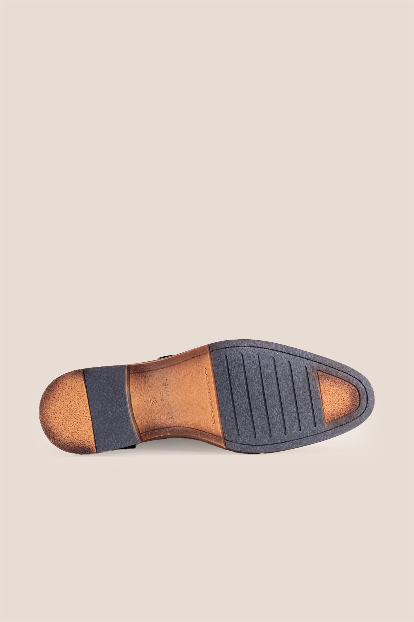 Premium men's black leather single monk strap dress shoes by Oswin Hyde London featuring a plain toe, adjustable silver buckle, contrast sole stitching, and a cushioned teal interior.