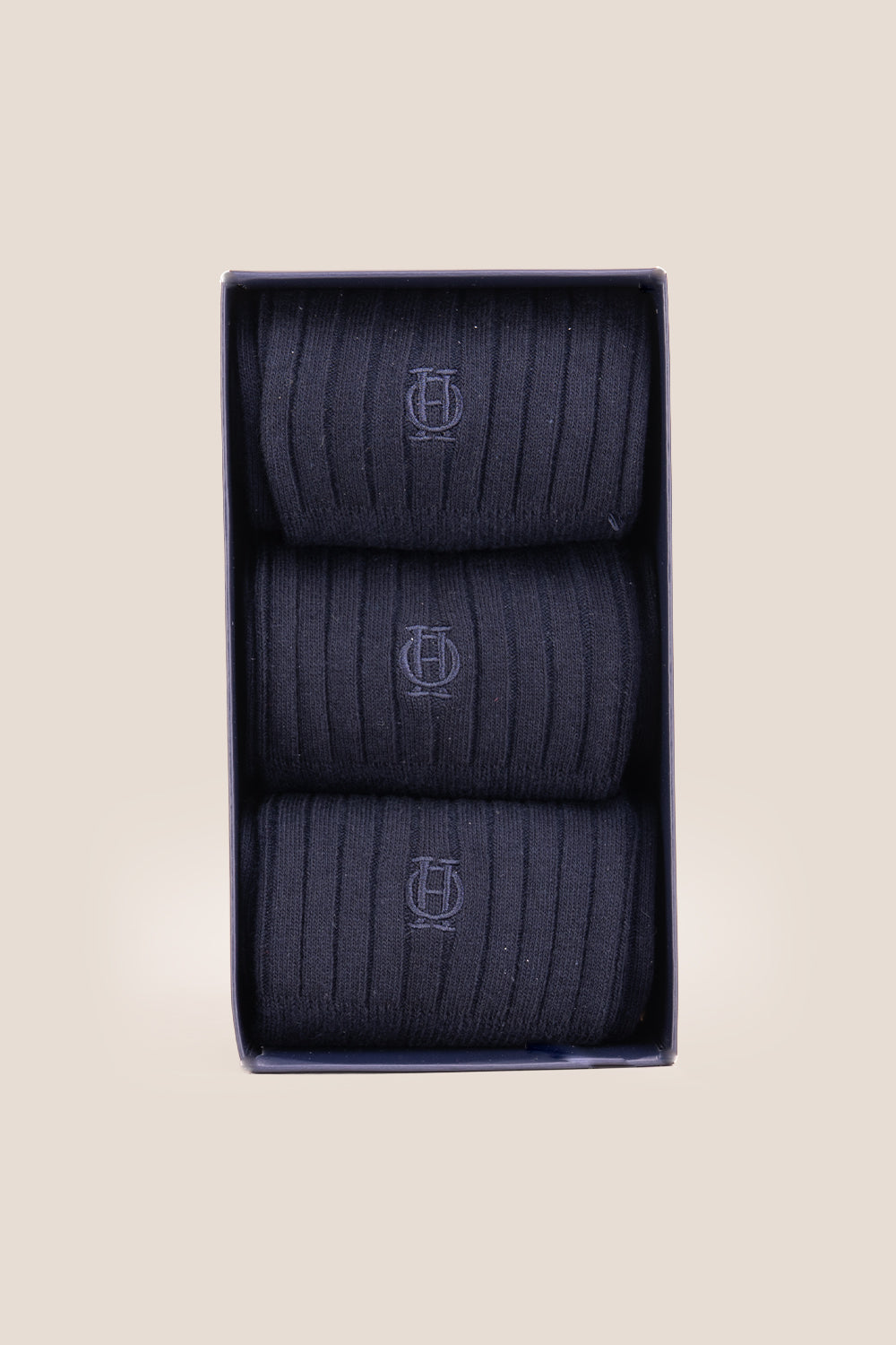 Three pairs of premium Navy cotton socks designed by Oswin Hyde for the discerning gentleman.