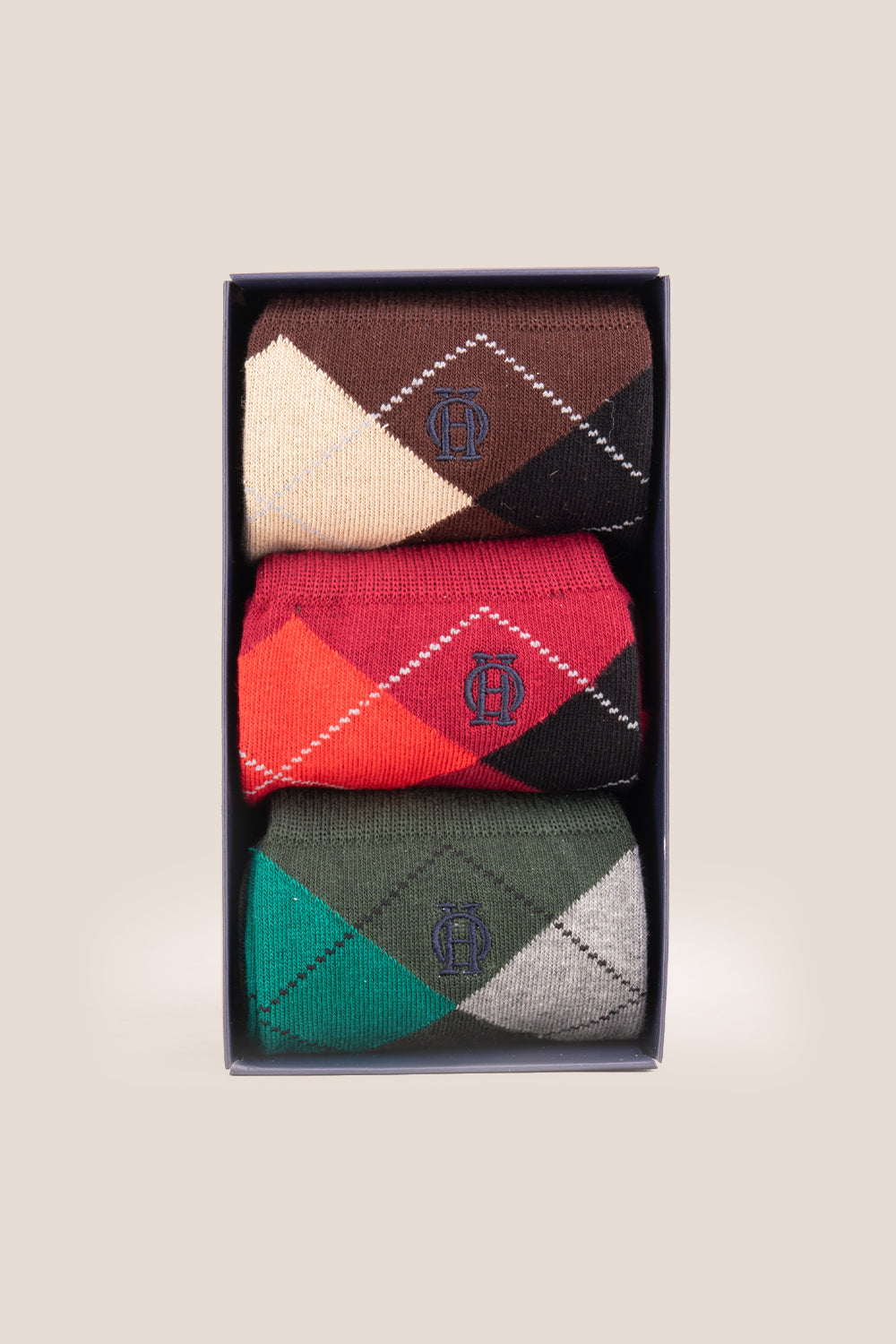 Three pairs of premium cotton socks designed by Oswin Hyde for the discerning gentleman.