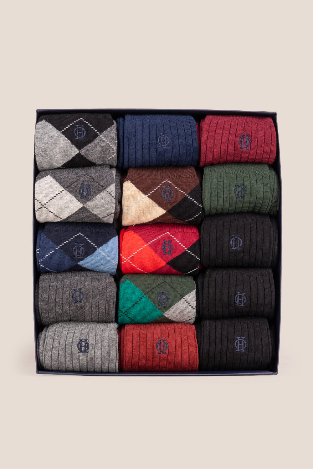 Fifteen pairs of premium cotton socks designed by Oswin Hyde for the discerning gentleman.