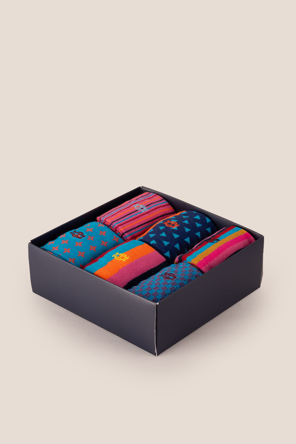 Oswin Hyde Contemporary six pairs of premium socks for men, featuring unique designs and timeless block colours.