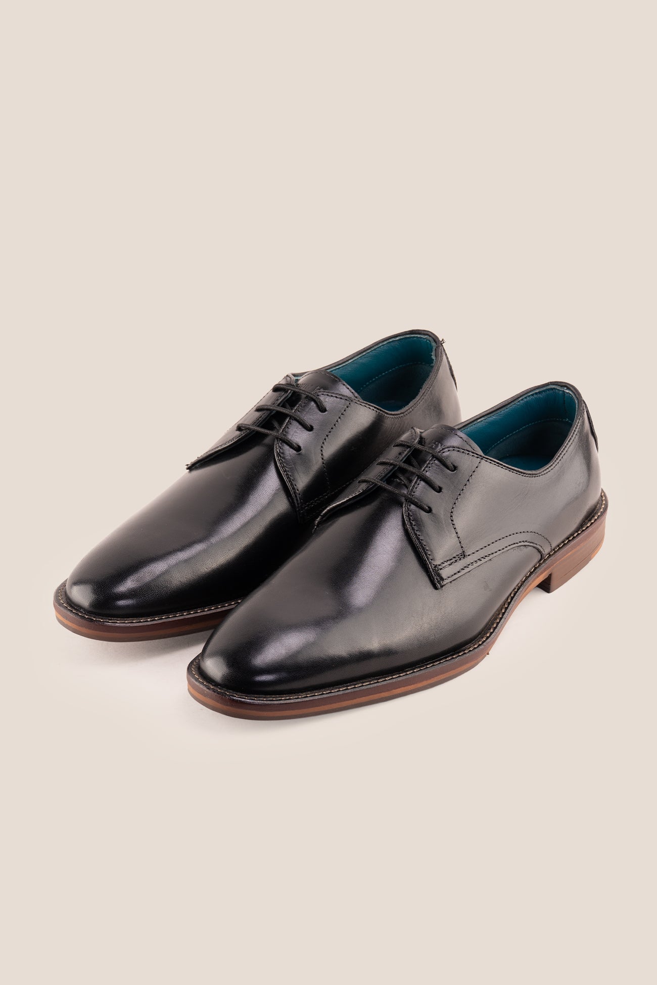 Nathan black leather Derby shoes for men featuring a 3-eyelet design, breathable lining, and durable leather sole for formal and smart casual occasions.