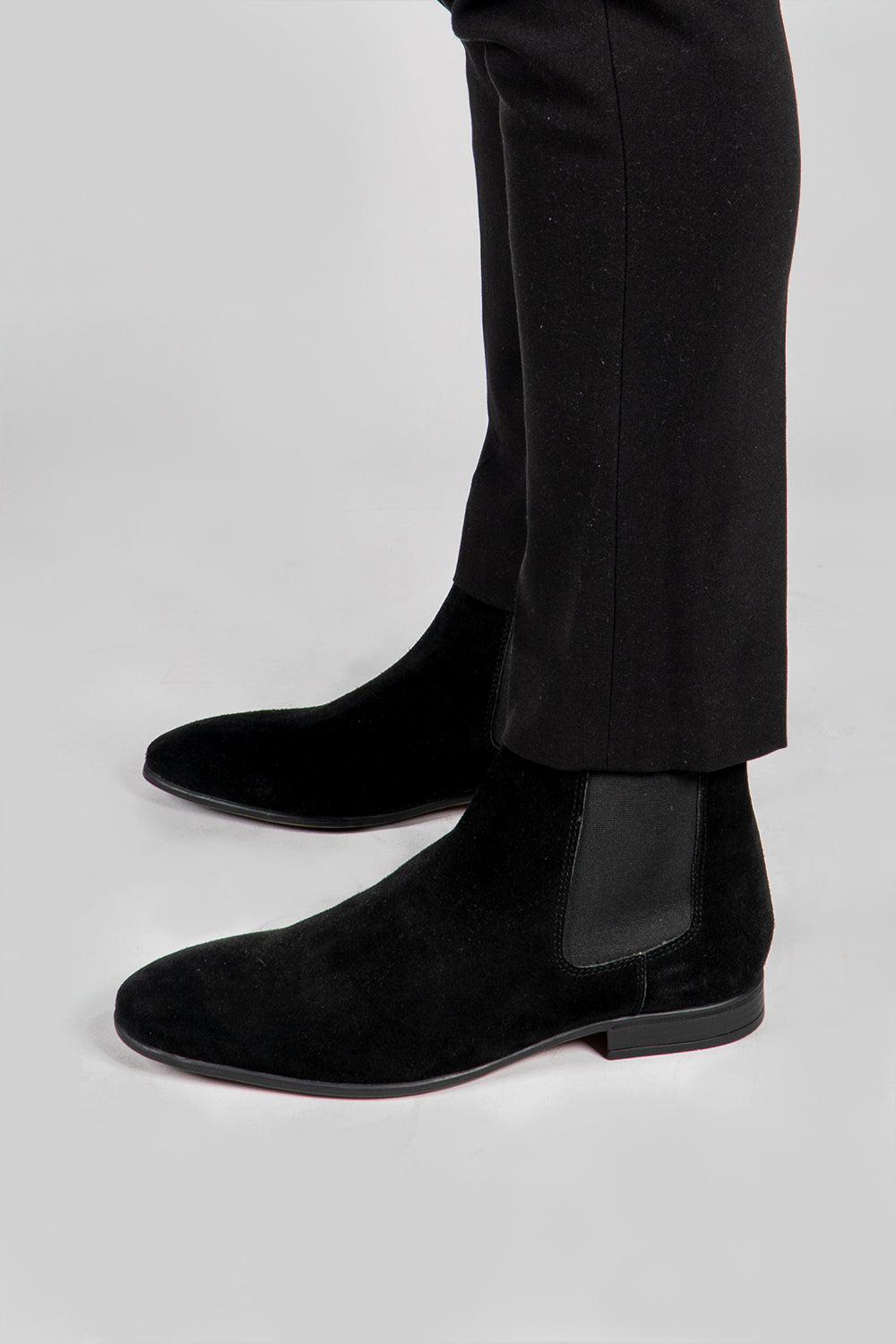 black trousers with black suede boots for men