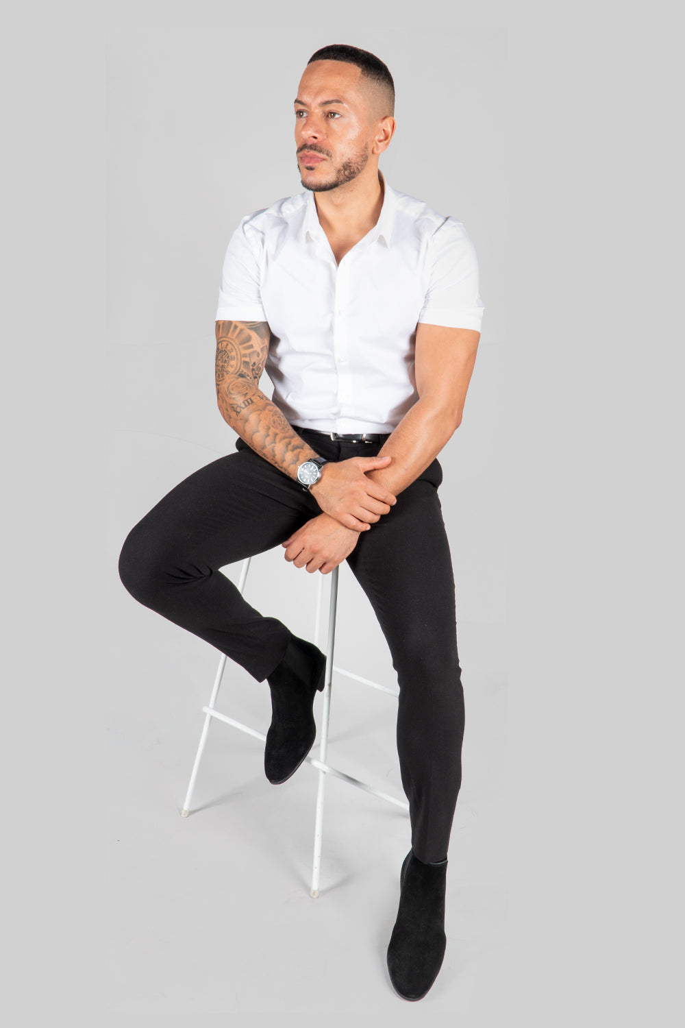 white shirt with black suede Chelsea boot 